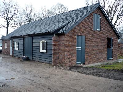 Het uiteindelijke resultaat, een prachtige boerderijwoning. met een mooi bijgebouw.